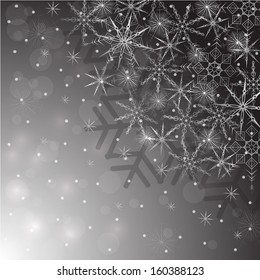 Different snowflakes over grey background