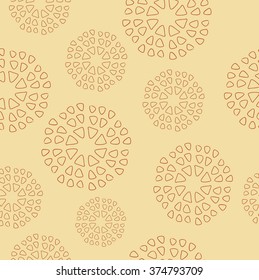 Different syzes abstract circles seamless pattern on the light orange background