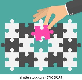 Different thinking concept. Hand placing or replacing pink puzzle piece in a black and white puzzle pattern. Flat design