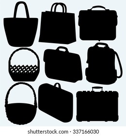 Different types of bags and baskets. Isolated on blue background. Vector silhouettes