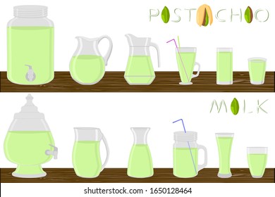 Kit diferentes tipos de vidrio, leche de pistacho en jarras de diferentes tamaños. Vidrio compuesto por jarras de plástico orgánico para leche de pistacho líquido. Saltos de leche de pistacho, cristalería sobre mesa de madera.