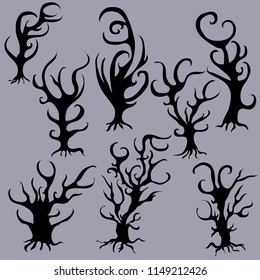 Different types of silhouettes of spooky magical trees