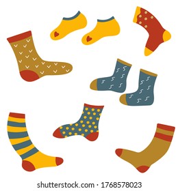 Different woolen socks, dotted and striped socks. Set of vector isolated elements