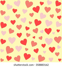 Differently sized hearts in different shades of red on pale yellow in a square format