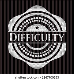 Difficulty silvery emblem or badge
