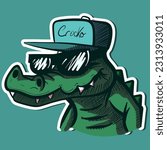 Digital art of a crocodile head wearing a hiphop hat and sunglasses. Vector of a green thug alligator with teeth.