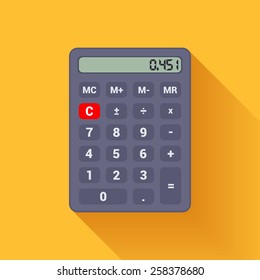Digital black calculator on the orange background