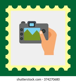 Digital camera in human hand
