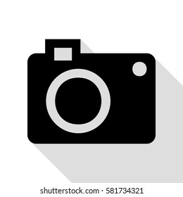 Digital camera sign. Black icon with flat style shadow path.