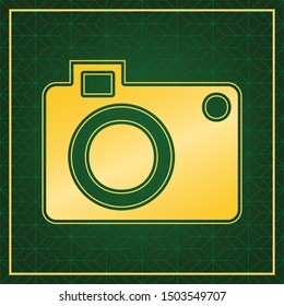 Digital camera sign. Golden icon with gold contour at dark green gridded white background. Illustration.