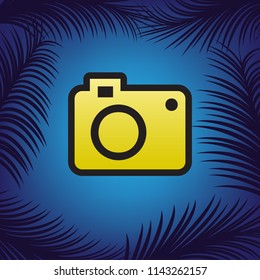 Digital camera sign. Vector. Golden icon with black contour at blue background with branches of palm trees.