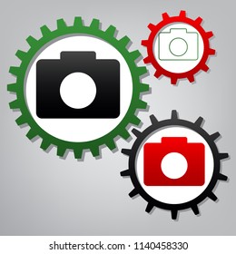 Digital camera sign. Vector. Three connected gears with icons at grayish background.