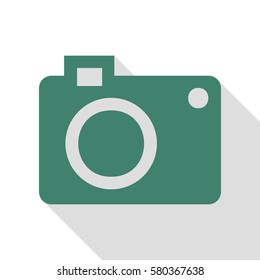 Digital camera sign. Veridian icon with flat style shadow path.