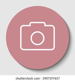 Digital camera sign. White contoured icon on rosy brown button with shadow. Illustration.