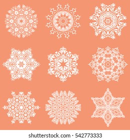 Digital hand drawn of element in the clean, whimsical and modern surface on a pink background. 9 vector snowflakes and christmas winter set.