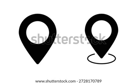 A digital illustration showcasing two minimalist black map pin icons on a clean white background. The first icon is a classic solid black teardrop shape with a prominent white circle at its center, universally recognized as a location marker. The second icon is similar but includes a subtle black circular outline at its base, emphasizing a marked spot or specific geographical point. These vector-based graphics are ideal for web, mobile applications, or print designs related to mapping, navigation, GPS, geotagging, or finding places.