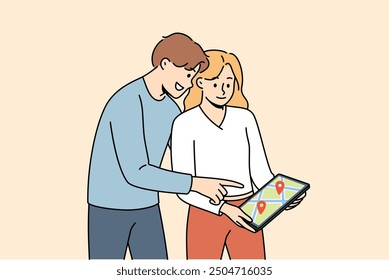 Digital maps are used by man and woman to plot route while traveling to new city. Happy couple holding electronic tablet with street map for navigation and geotags of must-see places