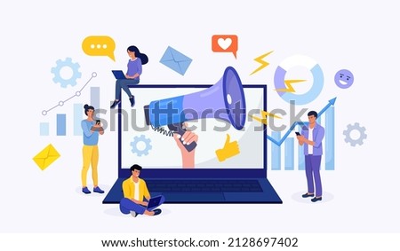 Digital marketing. Hand holding megaphone coming out from laptop. Business analysis, content strategy and management. Advertising Social media campaign, communication, SEO.