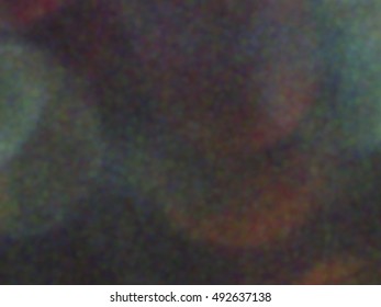 Digital multicolor noise, special effect. Blurred rhythmic spots. Dark background. Abstract composition, vector EPS10. Not trace image, include mesh gradient only