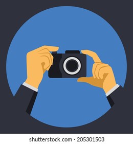 Digital Photo Camera with Hands in Flat Retro Style. Vector illustration