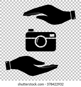 Digital photo camera icon. Save or protect symbol by hands.