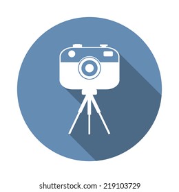 Digital photo camera on small tripod vector, flat