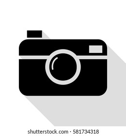 Digital photo camera sign. Black icon with flat style shadow path.