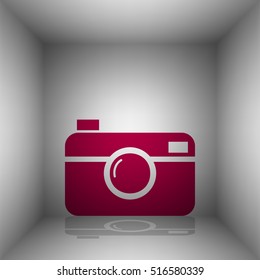 Digital photo camera sign. Bordo icon with shadow in the room.