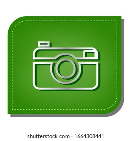 Digital photo camera sign. Silver gradient line icon with dark green shadow at ecological patched green leaf. Illustration.