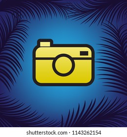 Digital photo camera sign. Vector. Golden icon with black contour at blue background with branches of palm trees.