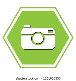 Digital photo camera sign. Vector. White icon with black shadow at yellow green honeycomb on white background.