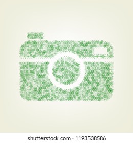 Digital photo camera sign. Vector. Green hexagon rastered icon and noised opacity and size at light green background with central light.