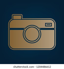 Digital photo camera sign. Vector. Golden icon and border at dark cyan background.