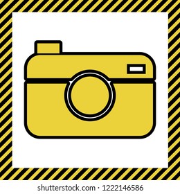 Digital photo camera sign. Vector. Warm yellow icon with black contour in frame named as under construction at white background. Isolated.