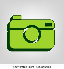 Digital photo camera sign. Vector. Yellow green solid icon with dark green external body at light colored background.