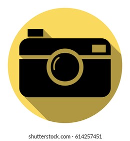 Digital photo camera sign. Vector. Flat black icon with flat shadow on royal yellow circle with white background. Isolated.