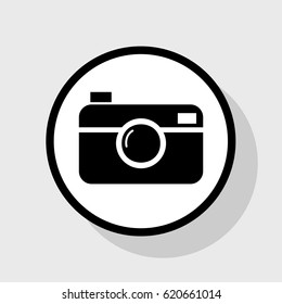 Digital photo camera sign. Vector. Flat black icon in white circle with shadow at gray background.