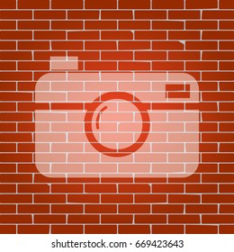 Digital photo camera sign. Vector. Whitish icon on brick wall as background.