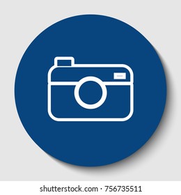 Digital photo camera sign. Vector. White contour icon in dark cerulean circle at white background. Isolated.