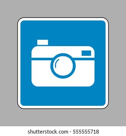 Digital photo camera sign. White icon on blue sign as background.