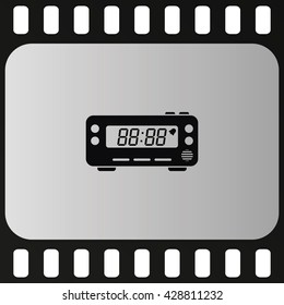 Digital radio clock.