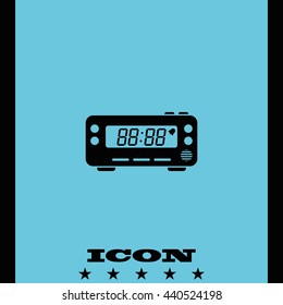 Digital radio clock.