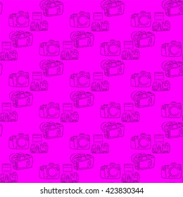 Digital SLR camera on a pink background seamless pattern