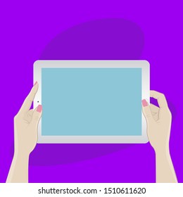 Digital tablet in hands on a purple background