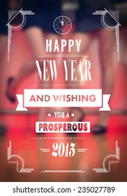 Digitally generated New years message against blurred girls legs