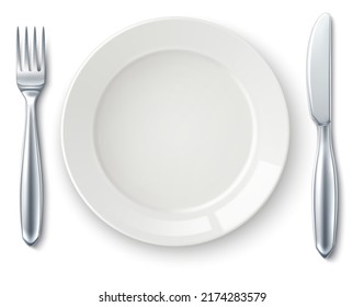 Dining serving dish with fork and knife top view