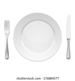 Dinner plate with cutlery: knife and fork, isolated on white