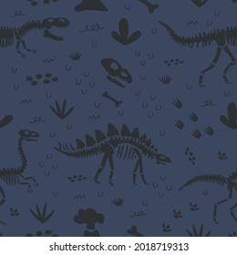 Dinosaur bones seamless pattern on dark blue background. Funny Vector illustration Dino skeleton in Scandinavian style. Childish design for baby clothes, bedding, textiles, print, wallpaper.