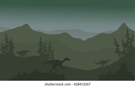 Dinosaur eoraptor in hills at the night