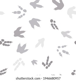 Dinosaur footprint tracks. Minimal color seamless pattern. Background with paw, claw predator. Dinosaur footprint seamless pattern perfect for textile, wrap and wallpaper and design